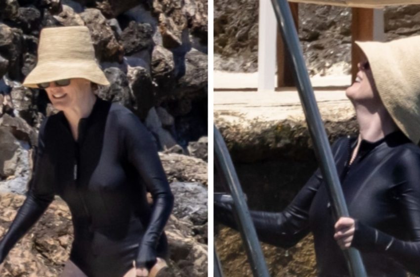  Sie ist 64 und zieht in Italien alle Blicke auf sich!: Hollywood-Ikone zeigt zeitlose Schönheit in gewagtem schwarzen Badeanzug, über den gerade jeder spricht!